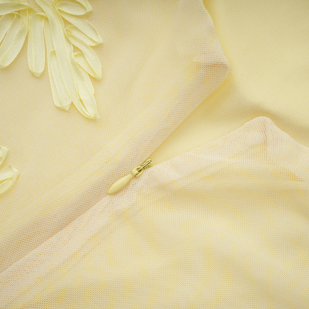 Vestido largo tipo corsé con apliques florales amarillos