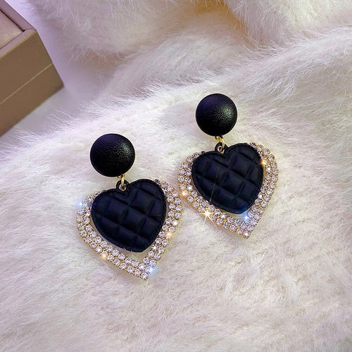 Boucles d'oreilles en cœur noir en or