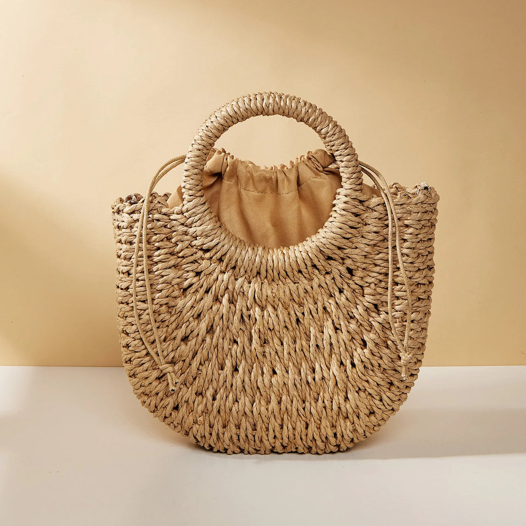Bolso bandolera de mimbre y ratán con forma de media luna